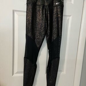 Nike Black and Gold Leggings with Mesh